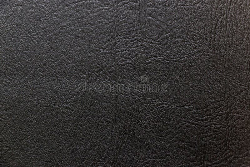 Close-up of a black leather lady bag for abstract background, banner, business card, brochure template or poster. Close-up of a black leather lady bag for abstract background, banner, business card, brochure template or poster.