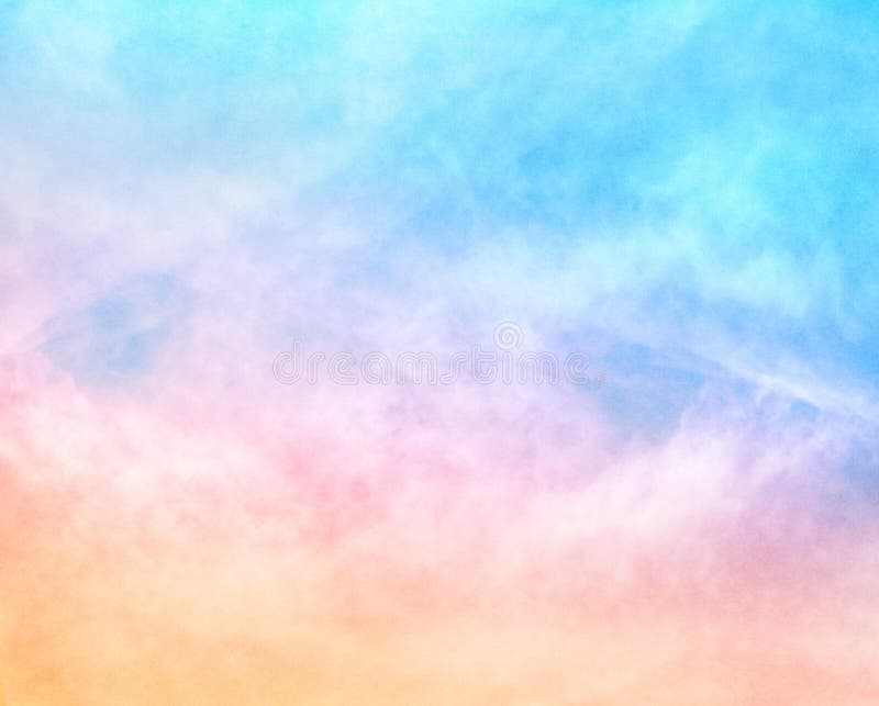 A soft cloud background with a pastel colored orange to blue gradient. Image features a pleasing paper grain and texture at 100 percent. A soft cloud background with a pastel colored orange to blue gradient. Image features a pleasing paper grain and texture at 100 percent.