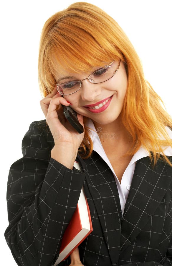 Businesswoman with book making a phone call. Businesswoman with book making a phone call