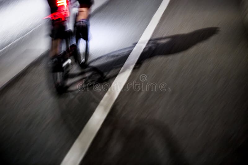 Shadow of cyclists at night-. Shadow of cyclists at night-