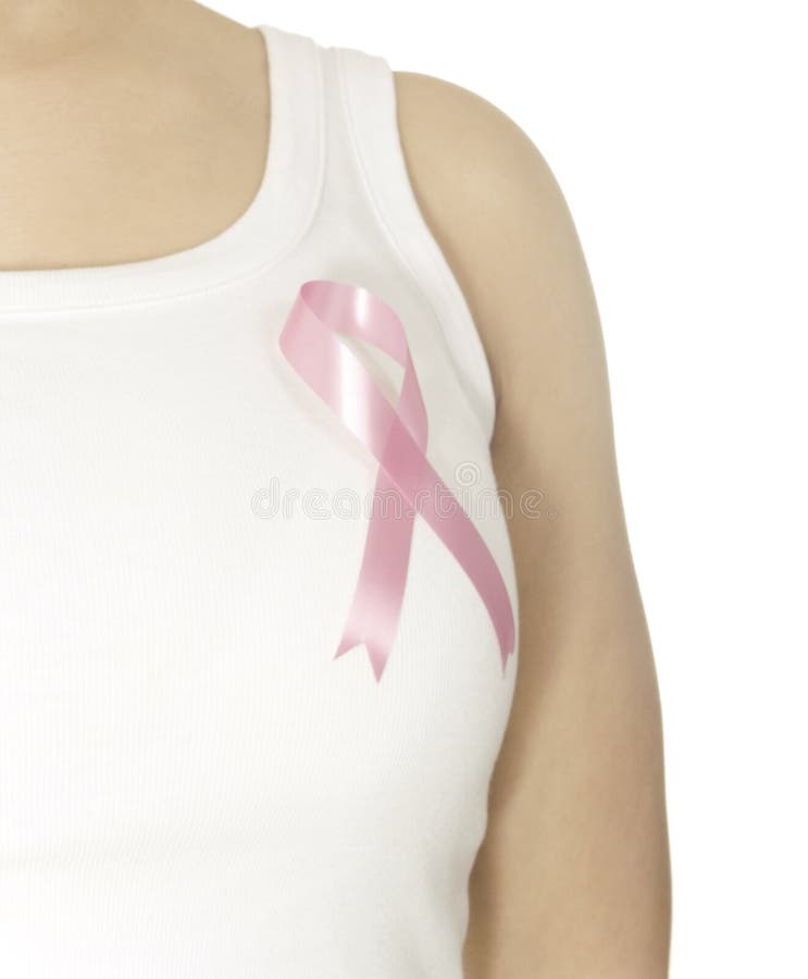 Pink breast cancer ribbon on woman chest. Pink breast cancer ribbon on woman chest