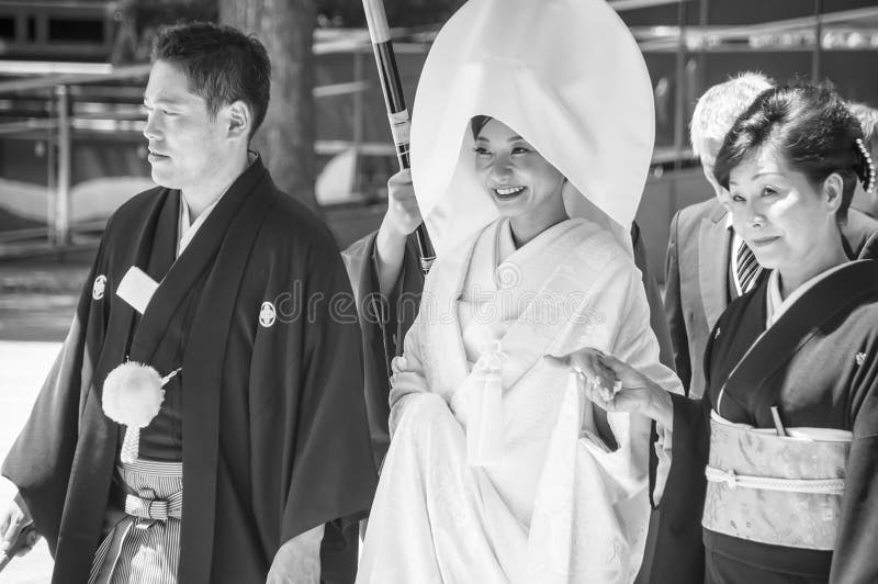 TOKYO, JAPAN, JULY 10: Celebration of a typical wedding in Japan on July 10, 2011 in Tokyo, Japan. The date that most weddings are held in November is the month because the 11 is a lucky number. The wedding is rapid, flow, protocol and little joy. TOKYO, JAPAN, JULY 10: Celebration of a typical wedding in Japan on July 10, 2011 in Tokyo, Japan. The date that most weddings are held in November is the month because the 11 is a lucky number. The wedding is rapid, flow, protocol and little joy