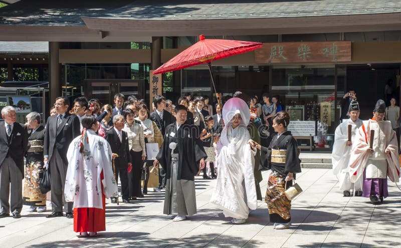 TOKYO, JAPAN, JULY 10: Celebration of a typical wedding in Japan on July 10, 2011 in Tokyo, Japan. The date that most weddings are held in November is the month because the 11 is a lucky number. The wedding is rapid, flow, protocol and little joy. TOKYO, JAPAN, JULY 10: Celebration of a typical wedding in Japan on July 10, 2011 in Tokyo, Japan. The date that most weddings are held in November is the month because the 11 is a lucky number. The wedding is rapid, flow, protocol and little joy