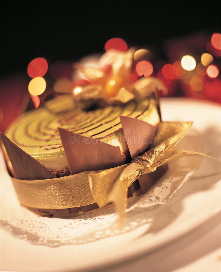 Christmas cake with big ribbon around it. Christmas cake with big ribbon around it