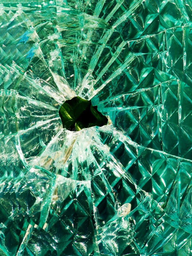 Glass broken thick with cracks. Glass broken thick with cracks