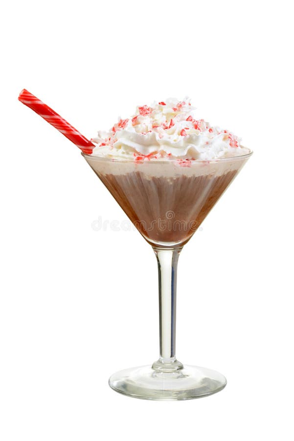 Isolated chocolate candy cane martini with peppermint stick. Isolated chocolate candy cane martini with peppermint stick