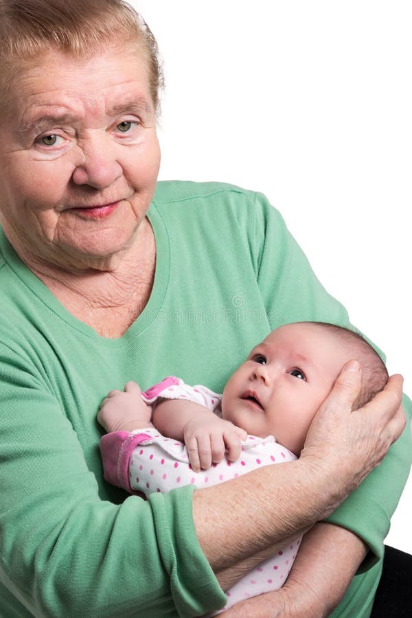 удерживание бабушки младенца newborn стоковое фото удерживание бабушки младенца newborn стоковое фото