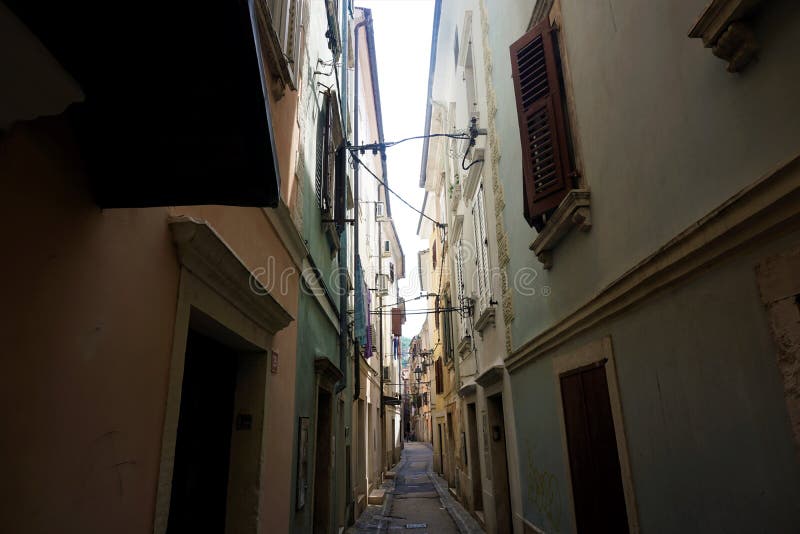 Узкая улица в backstreets Piran стоковая фотография Узкая улица в backstreets Piran стоковая фотография