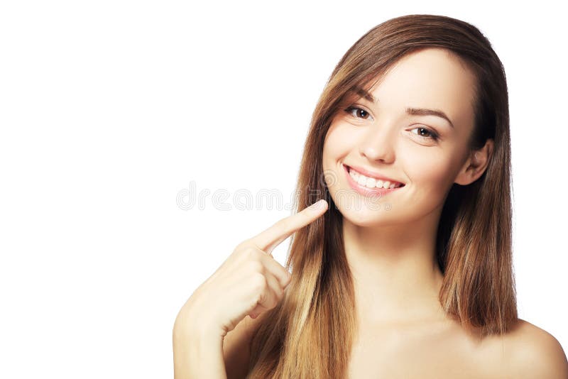 Picture of beautiful woman pointing to teeth. Picture of beautiful woman pointing to teeth