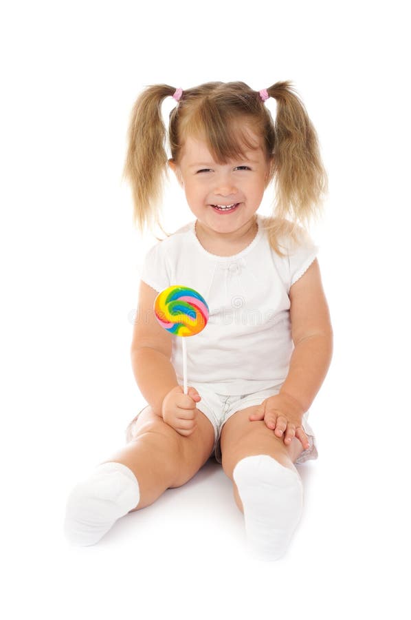 усмехаться lollipop девушки малый стоковые изображения