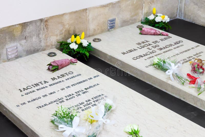 Sanctuary of Fatima, Portugal, March 07, 2015 - Tombs of Jacinta Marto and Sister Lucia, two of the three young shepherds that witnessed the apparition and miracle. Basilica of Our Lady of the Rosary. Sanctuary of Fatima, Portugal, March 07, 2015 - Tombs of Jacinta Marto and Sister Lucia, two of the three young shepherds that witnessed the apparition and miracle. Basilica of Our Lady of the Rosary