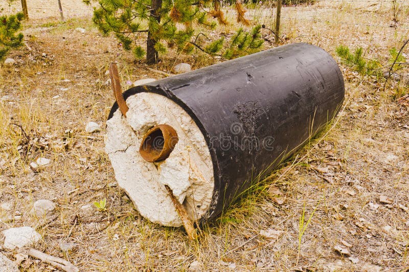 A pipe section used to move tailings to a tailings pond at a copper mine. A pipe section used to move tailings to a tailings pond at a copper mine.