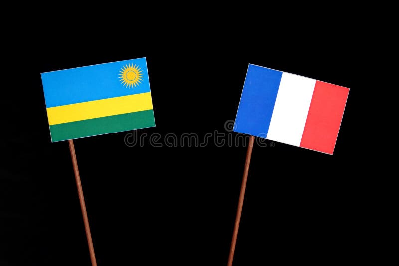 Флаг Руанды с флагом француза на черноте стоковое изображение rf