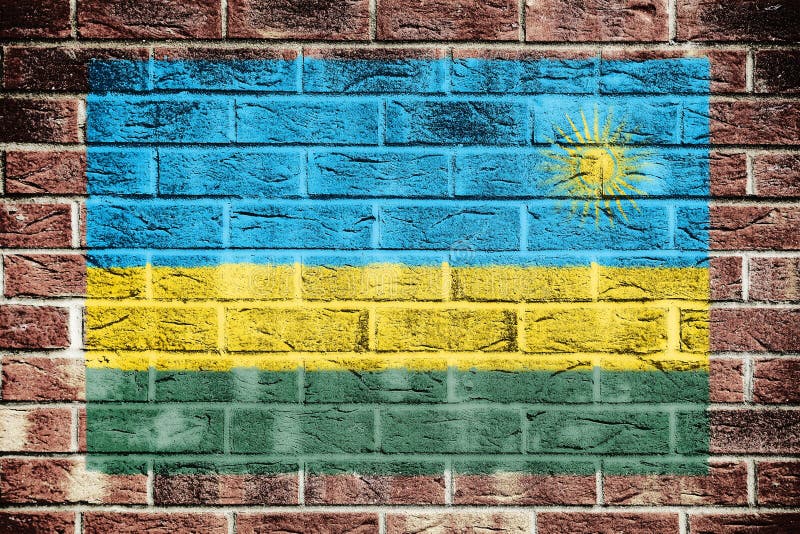 флаг руанда на фоне старой кирпичной стены стоковые фото