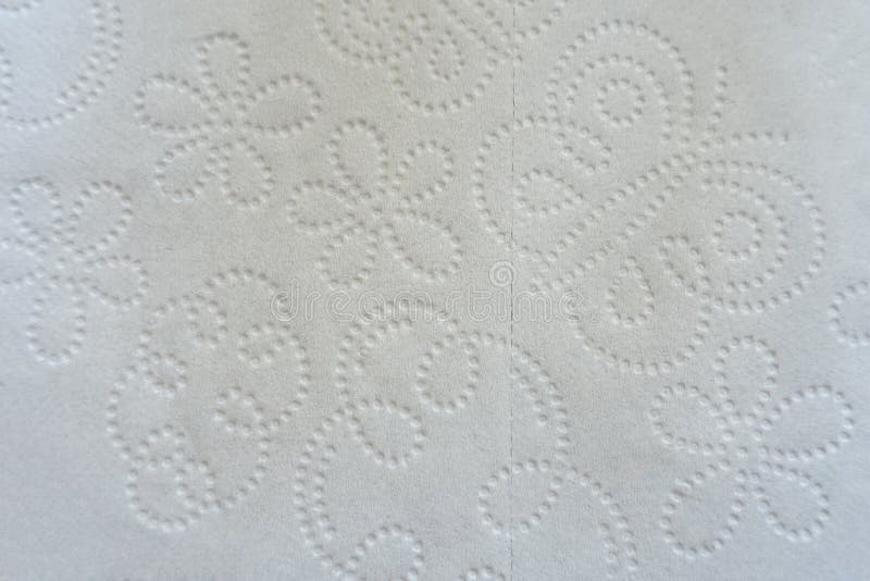 Quilted Toilet Paper or Paper Towel Background with Perforated Seam. Quilted Toilet Paper or Paper Towel Background with Perforated Seam