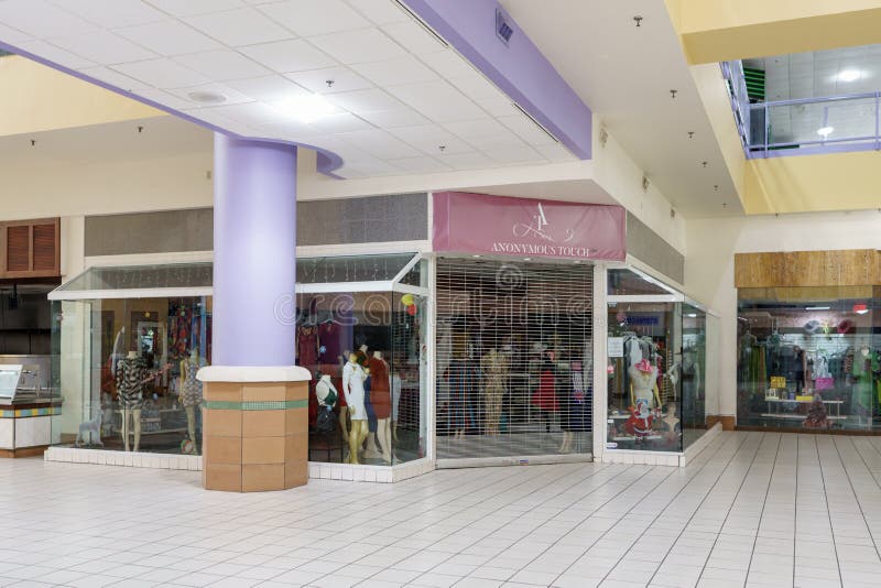 Miami, FL, USA - December 29, 2022: Interior photo of the outdated style 163rd Street Mall in NMB North Miami with most tenant shops out of business. Miami, FL, USA - December 29, 2022: Interior photo of the outdated style 163rd Street Mall in NMB North Miami with most tenant shops out of business