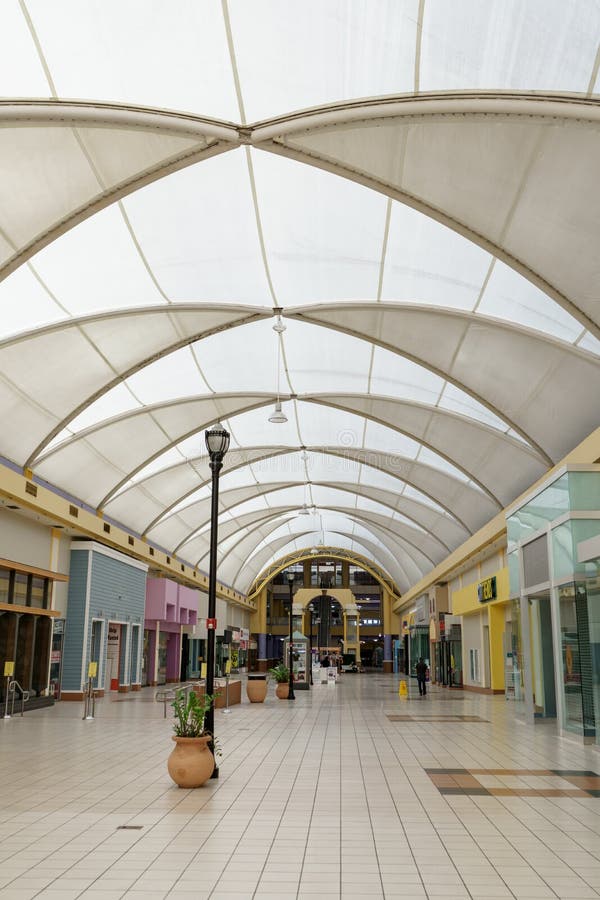 Miami, FL, USA - December 29, 2022: Interior photo of the outdated style 163rd Street Mall in NMB North Miami with most tenant shops out of business. Miami, FL, USA - December 29, 2022: Interior photo of the outdated style 163rd Street Mall in NMB North Miami with most tenant shops out of business