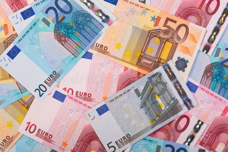 Photo of overlapping Euro banknotes in various denominations. Photo of overlapping Euro banknotes in various denominations.