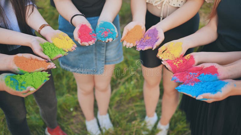 Holi paints in the hands of girls. Holi paints in the hands of girls