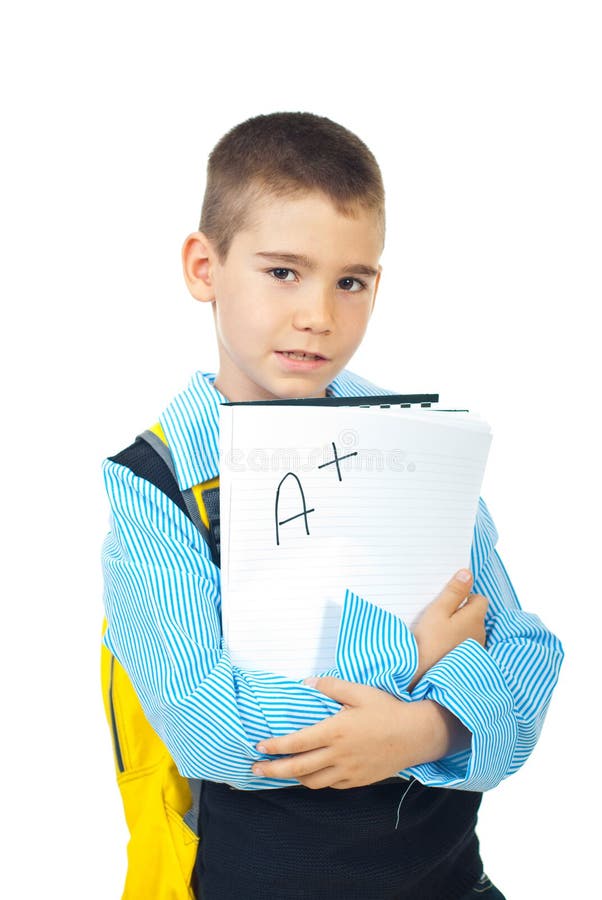 Школьник держит хороший результат теста стоковые изображения