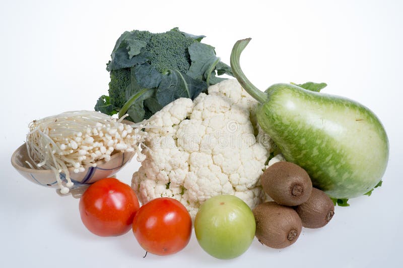 Цветная капуста, киви, томаты, jujubes, брокколи, золотой гриб иглы и тыква бутылки стоковая фотография rf Цветная капуста, киви, томаты, jujubes, брокколи, золотой гриб иглы и тыква бутылки стоковая фотография rf