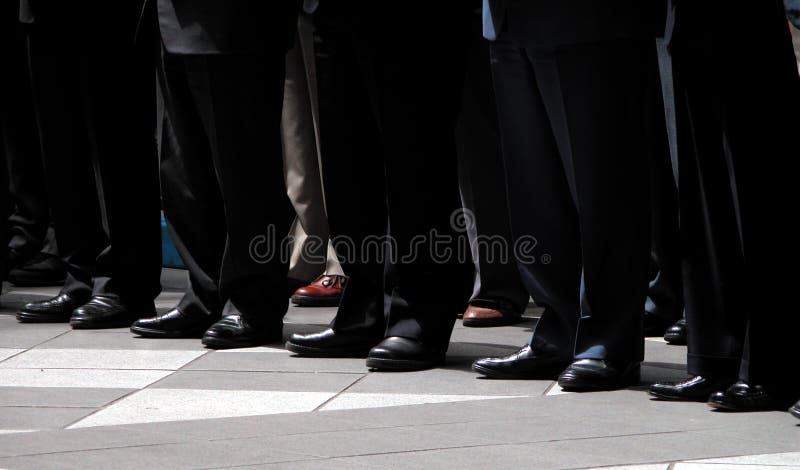 A group of mens at an official ceremony in Japan. A group of mens at an official ceremony in Japan.