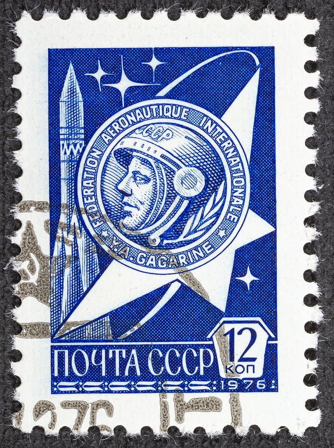 USSR - CIRCA 1979: A stamp printed in Russia, shows Yuri Gagarin and Soviet spaceship VOSTOK-1 . USSR - CIRCA 1979: A stamp printed in Russia, shows Yuri Gagarin and Soviet spaceship VOSTOK-1 .