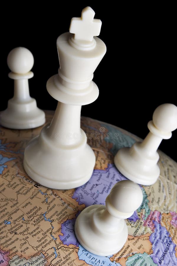 Chess pieces on an earth globe representing business concepts or political metaphors. Chess pieces on an earth globe representing business concepts or political metaphors.