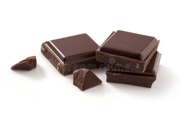 A few pieces of chocolate isolated on white background. Cleaned and retouched photo. Clipping path included. A few pieces of chocolate isolated on white background. Cleaned and retouched photo. Clipping path included.