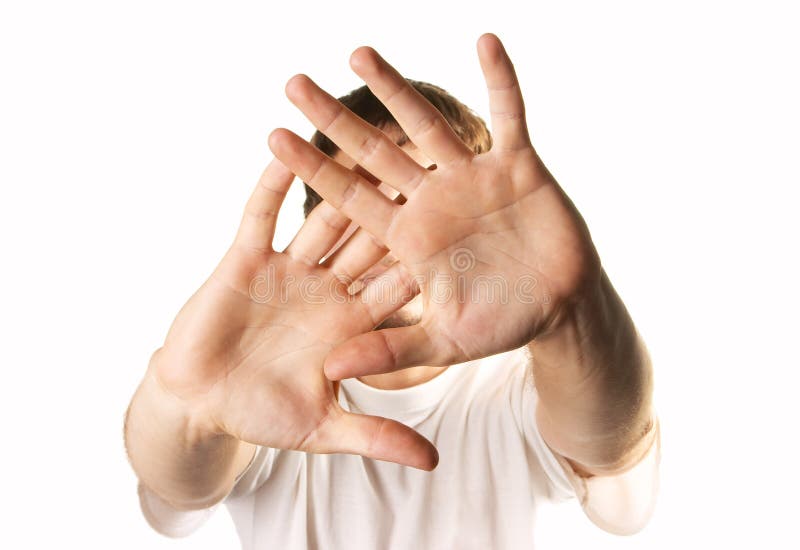 Man hiding face isolated over white. Man hiding face isolated over white