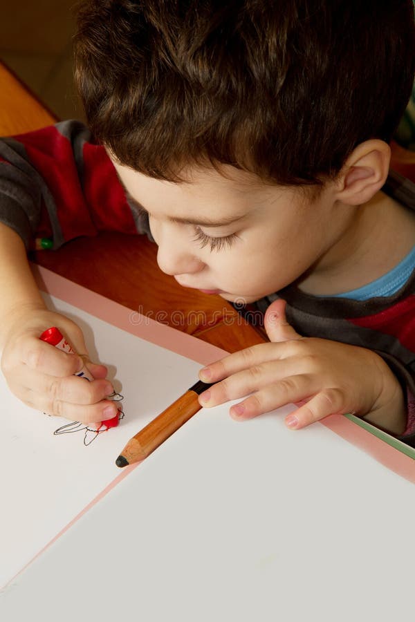 Рисующий ребенок стоковое изображение rf
