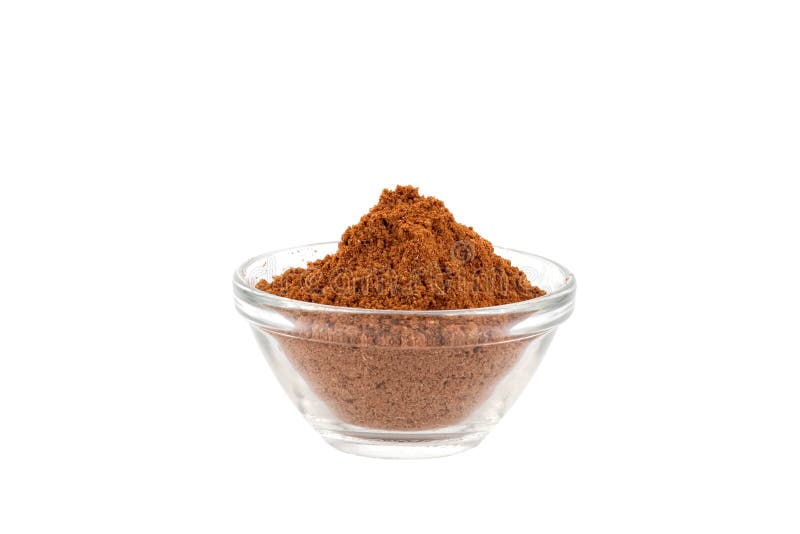 Five spice powder in glass bowl, white background. Five spice powder in glass bowl, white background