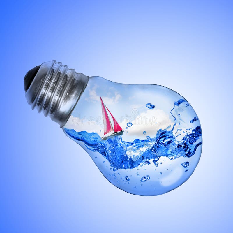 Energy concept. Light bulb with water and yacht inside isolated on white. Energy concept. Light bulb with water and yacht inside isolated on white