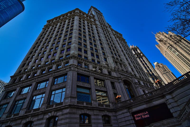 The Tribune tower and Wrigley building as viewed from the Chicago River. The Tribune tower and Wrigley building as viewed from the Chicago River.