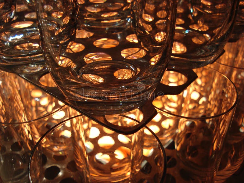 Glasses stacked with light shining through. Glasses stacked with light shining through