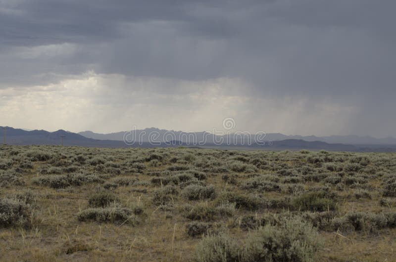 A dense storm moves over the plains of Wyoming. A dense storm moves over the plains of Wyoming.