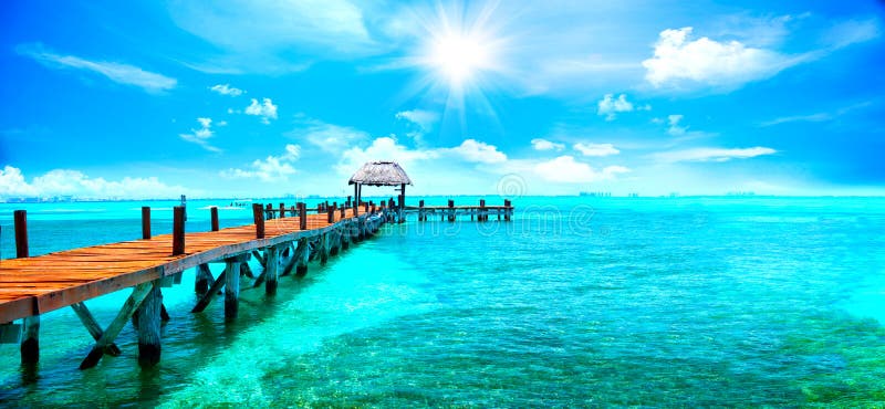 Exotic tropical resort. Jetty near Cancun, Mexico. Travel, Tourism and Vacations Concept. Exotic tropical resort. Jetty near Cancun, Mexico. Travel, Tourism and Vacations Concept