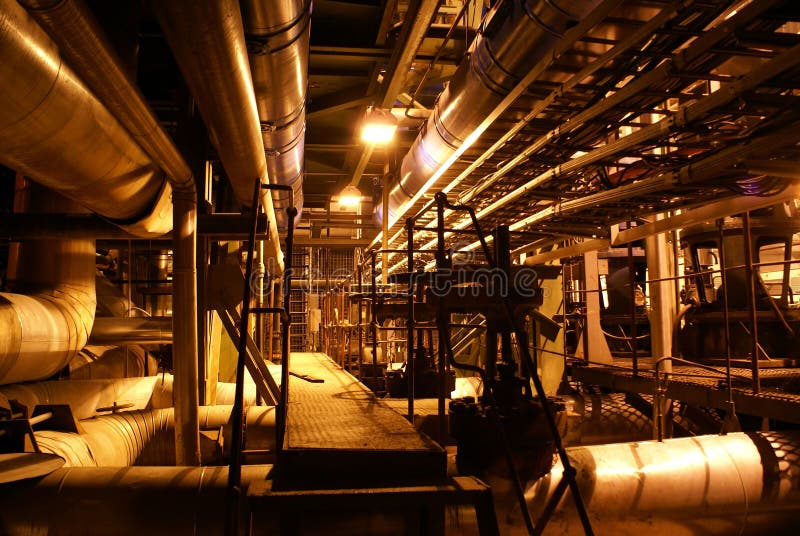 Different types of pipes and tanks inside energy plant. Different types of pipes and tanks inside energy plant