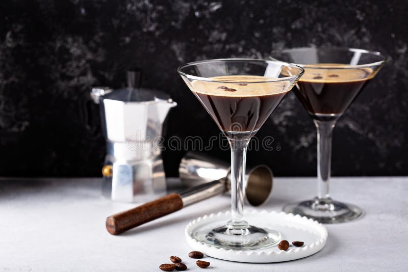 Espresso martini in two glasses, coffee cocktail concept. Espresso martini in two glasses, coffee cocktail concept