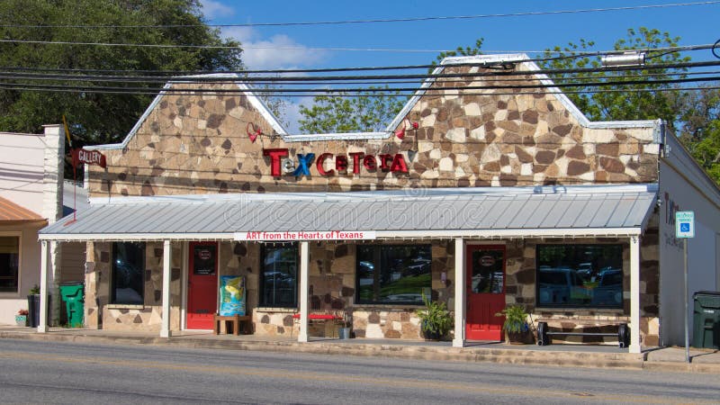 JOHNSON CITY TEXAS - APRIL 25 2018: Texcetera is an arts and craft gallery housed in what was once a library. JOHNSON CITY TEXAS - APRIL 25 2018: Texcetera is an arts and craft gallery housed in what was once a library