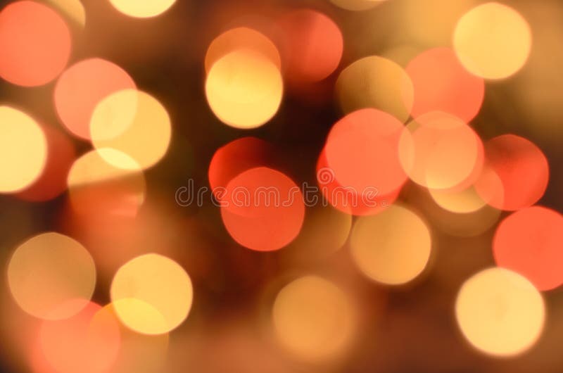 Яркая предпосылка Рожденственской ночи Множество золотого сверкная bokeh от defocused гирлянды освещает стоковые изображения Яркая предпосылка Рожденственской ночи Множество золотого сверкная bokeh от defocused гирлянды освещает стоковые изображения