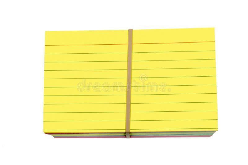Horizontal shot of a stack of brightly colored yellow index cards wrapped with a rubber band. Isolated on white. Horizontal shot of a stack of brightly colored yellow index cards wrapped with a rubber band. Isolated on white.