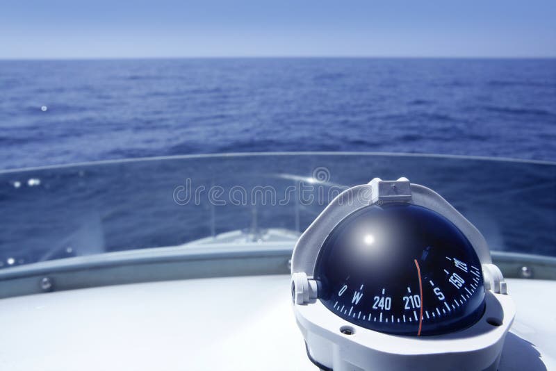 Compass on a yacht boat tower on a blue summer sea ocean day. Compass on a yacht boat tower on a blue summer sea ocean day