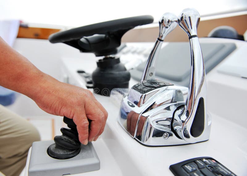 Captain at the helm of a luxury yacht. Captain at the helm of a luxury yacht.