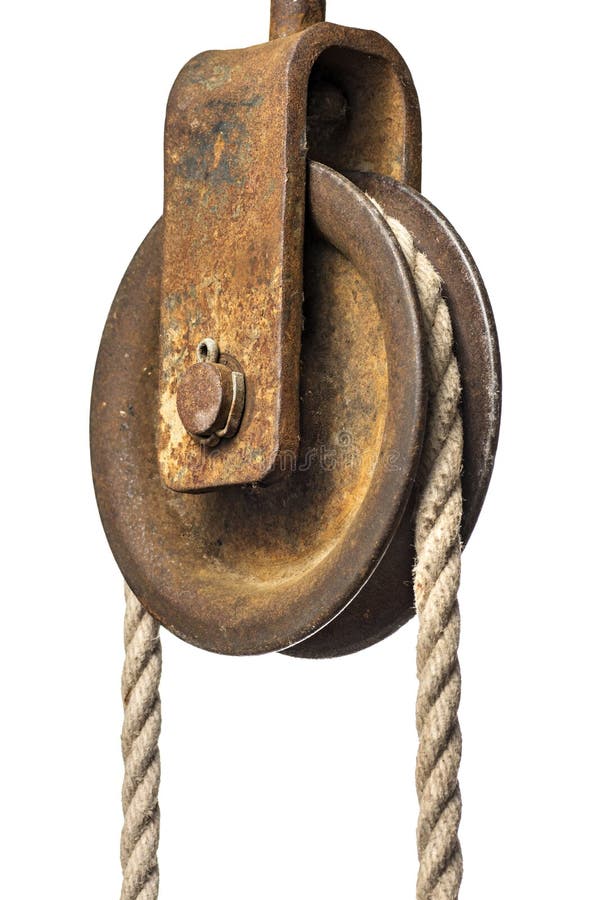 An old pulley with a rope. An old pulley with a rope