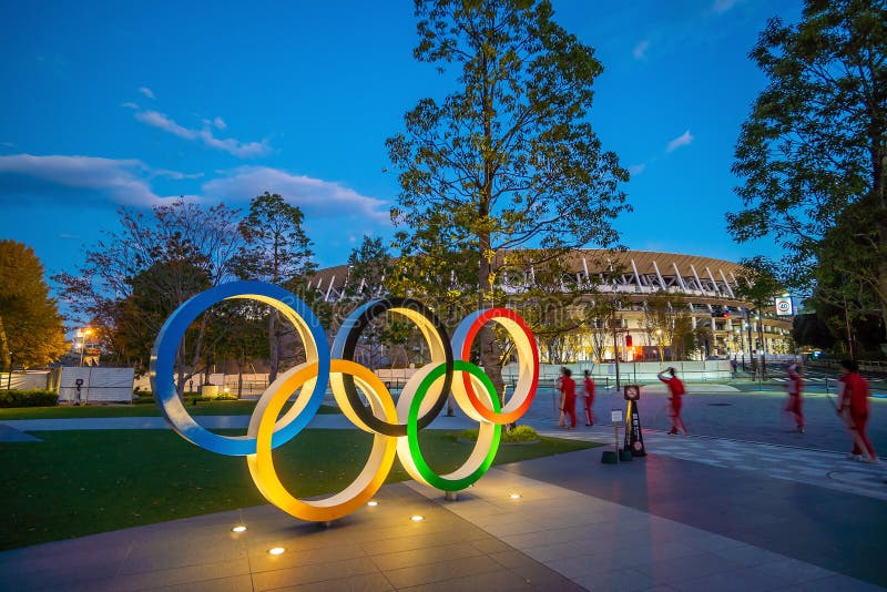 TOKYO, JAPAN - DECEMBER 5, 2019 : Landscape of New national stadium for Tokyo Olympic 2020 in Japan in Tokyo at twilight. TOKYO, JAPAN - DECEMBER 5, 2019 : Landscape of New national stadium for Tokyo Olympic 2020 in Japan in Tokyo at twilight