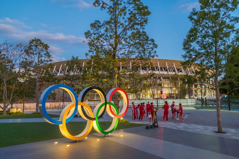 TOKYO, JAPAN - DECEMBER 5, 2019 : Landscape of New national stadium for Tokyo Olympic 2020 in Japan in Tokyo at twilight. TOKYO, JAPAN - DECEMBER 5, 2019 : Landscape of New national stadium for Tokyo Olympic 2020 in Japan in Tokyo at twilight