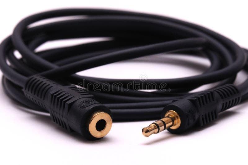 A photo taken on a 3.5mm male to female audio plug extension cable against a white backdrop. A photo taken on a 3.5mm male to female audio plug extension cable against a white backdrop.