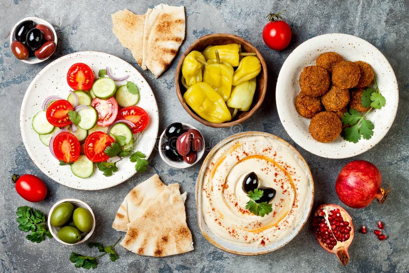 Middle Eastern traditional dinner. Authentic arab cuisine. Meze party food. Top view, flat lay, overhead. Middle Eastern traditional dinner. Authentic arab cuisine. Meze party food. Top view, flat lay, overhead