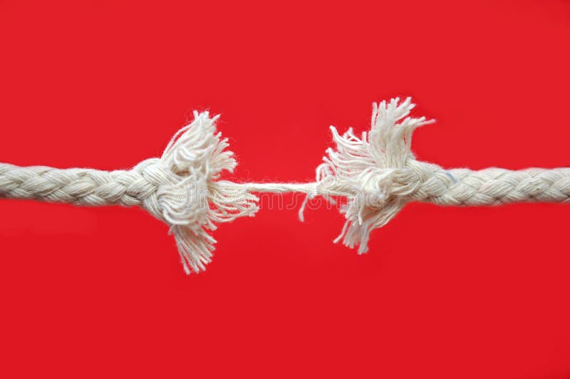 Rope gradually breaking into two pieces. Rope gradually breaking into two pieces